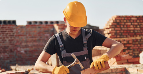 Man Working on Building Construction