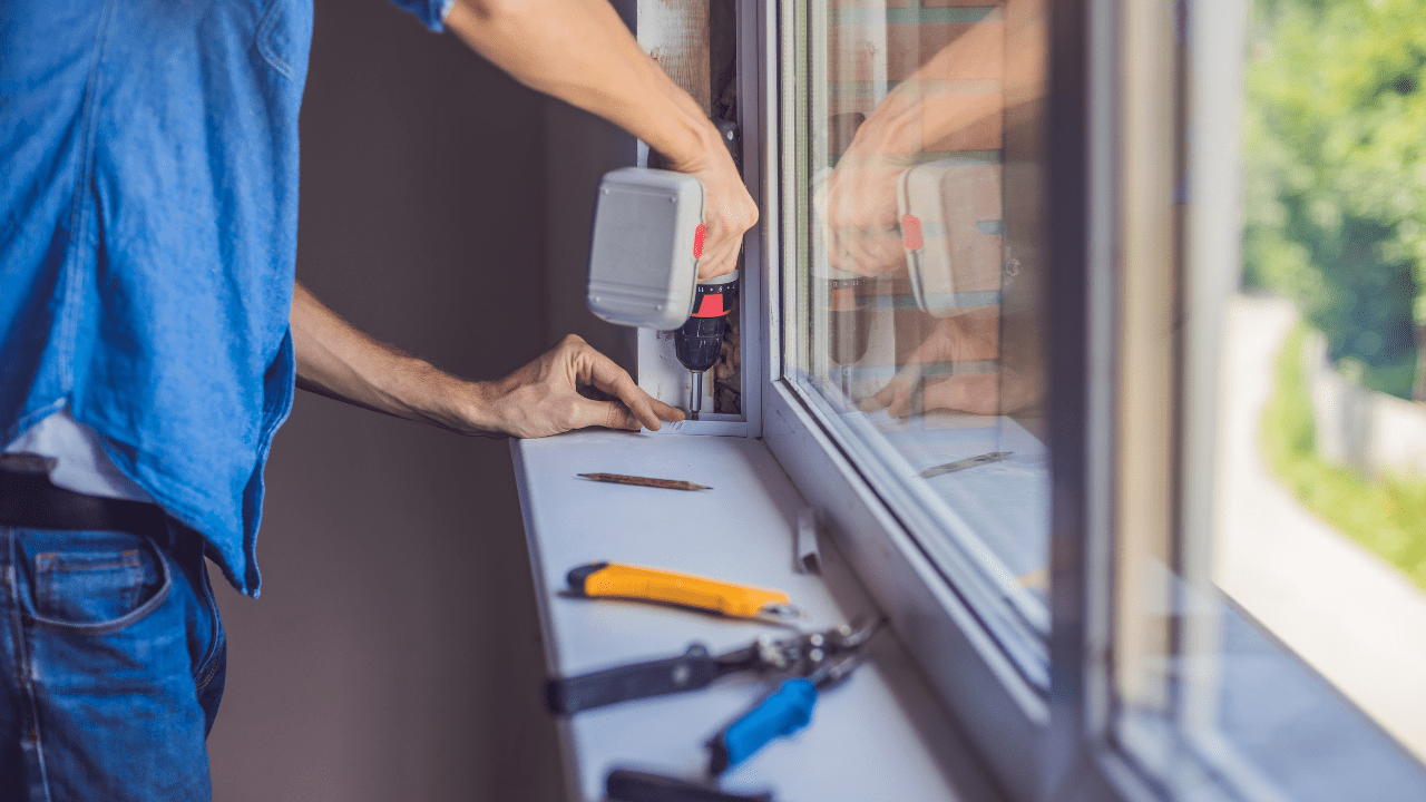 Man Working on Window Installation