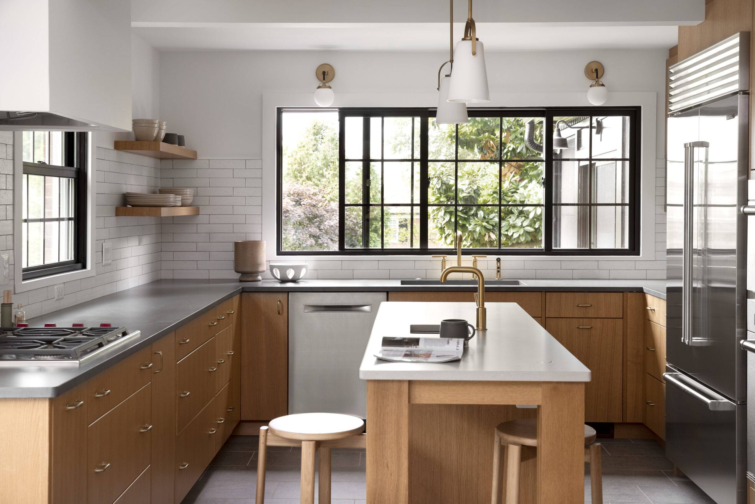 Modern kitchen with sleek and rustic elements.